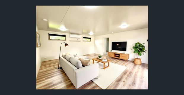 Fresh 2‑Bedroom Unit with Garage - Photo 1