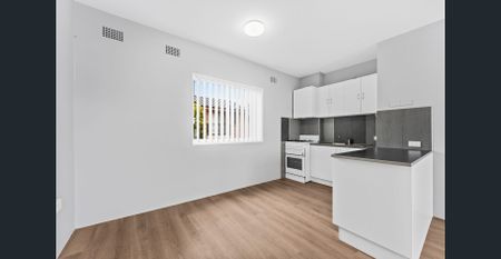 RENOVATED ONE BEDROOM UNIT - Photo 2