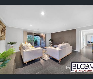 A lovely family home conveniently located close to all essential am... - Photo 1