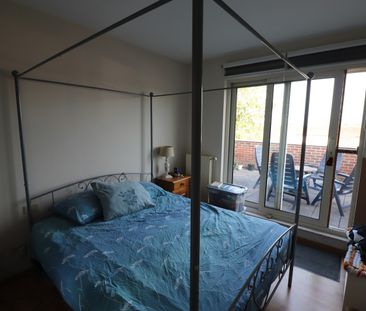 Ruim 2-slaapkamerappartement met lift, groot terras en ondergrondse autostaanplaats in het centrum van Baarle-Hertog - Foto 6