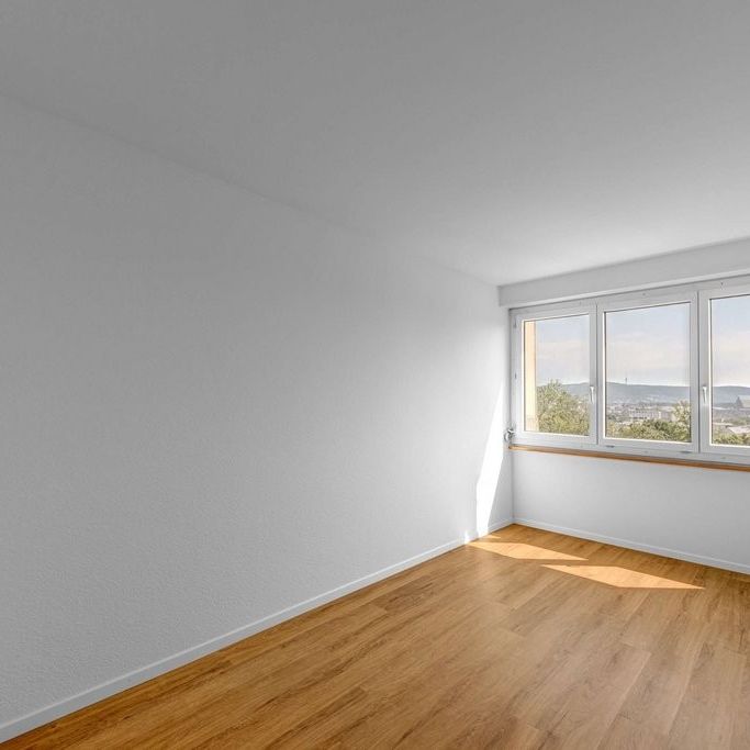 Ihr neues Zuhause mit urbanem Flair und wundervoller Aussicht! - Foto 1