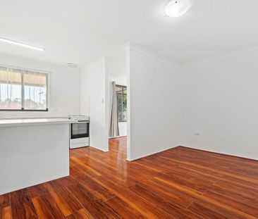 Spacious 3-Bedroom Home with Large Yard & New Kitchen - Photo 5