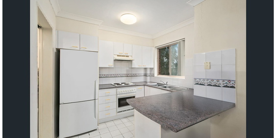 Neat 2 bedroom unit in security block - Photo 3