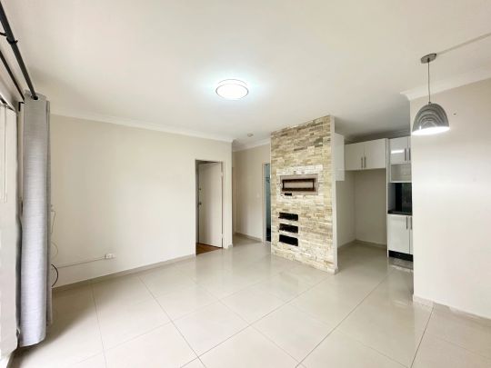 Stylish 2-Bedroom Apartment with Secure Lock-Up Garage! AVAILABLE NOW! - Photo 1