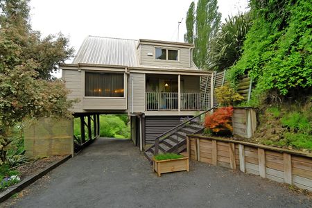 This very tidy two level home offers comfortable and convenient living close to Hamilton City Central and FMG Stadium. - Photo 2