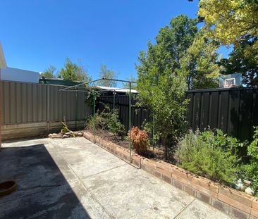 Sunlit, spacious, detached homette-style unit with private rear cou... - Photo 3