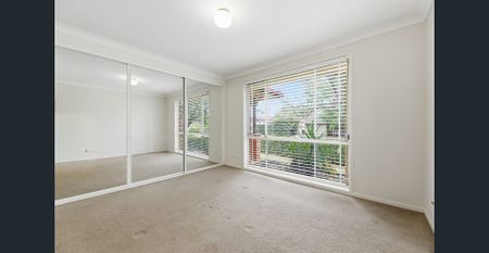 Modern Living Meets Everyday Comfort in This Immaculate Home - Photo 4