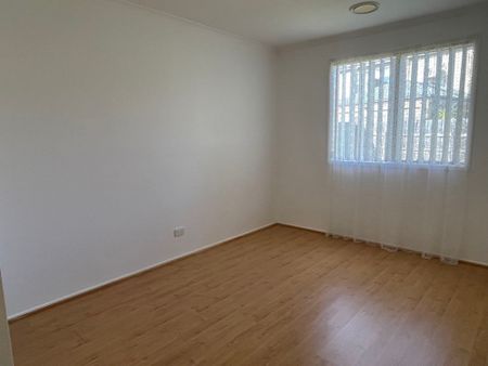 FOUR BEDROOM, TWO LIVING FAMILY HOME IN GREAT LOCATION - Photo 2