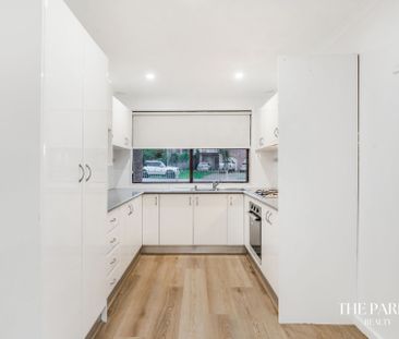 Newly Renovated Family Home in Sought after Bossley Park - Photo 6