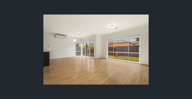 Bright and Spacious Family Home in Prime Location - Photo 1