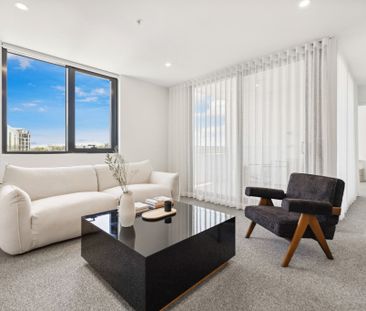 Contemporary Two-Bedroom Living in the Bowen Complex! - Photo 3