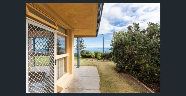 Ground-Floor Coastal Gem with Stunning Ocean Views - Photo 1