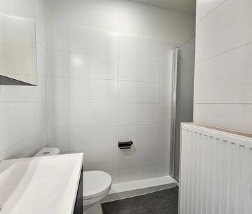 Vernieuwd en licht dakappartement in het centrum - Foto 4