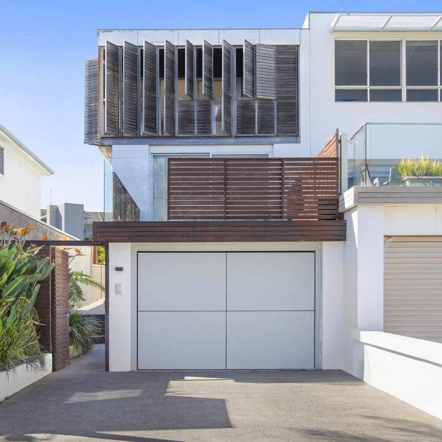 STUNNING COASTAL ARCHITECTURAL ABODE FLOODED IN NATURAL LIGHT - Photo 1