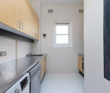 ULTIMATE CITY APARTMENT WITH AN ABUNDANCE OF CHARACTER! - Photo 5