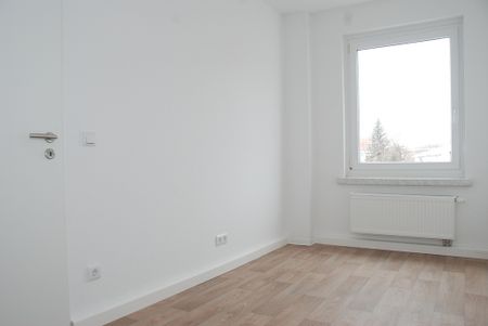 Schicke 3-Raum-Wohnung mit Balkon zum Verweilen - Foto 4