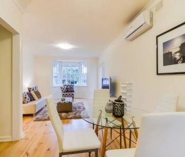 Stylish, Low-Maintenance Living in a Boutique Group of Four - Photo 1