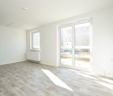 Mit Balkon und Hausgarten - Foto 1