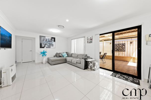 193 Braidwood Drive, Prestons NSW 2170 - House For Rent | Domain - Photo 1