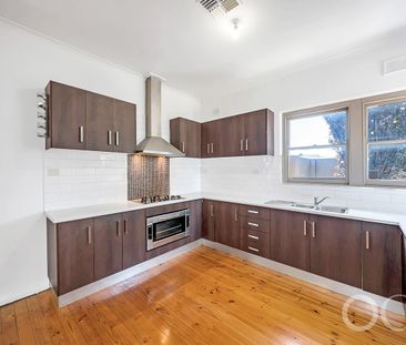 Open the Door to Style, Security, and Location in Woodville South - Photo 5