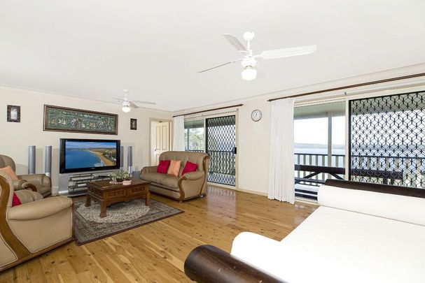 FULLY FURNISHED HOME WITH SPECTACULAR LAKE VIEWS - Photo 1