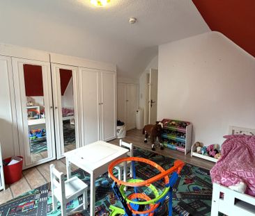 Geräumige 3‑Zimmer‑Wohnung im Erd- und Dachgeschoss eines Zweifamil... - Foto 2