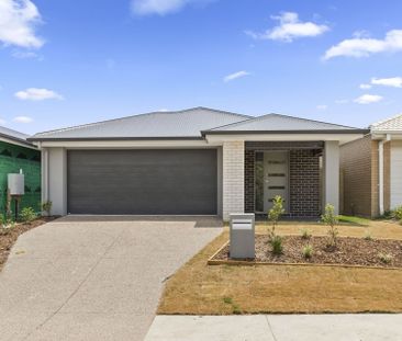 Modern Family Home with Fenced Backyard - Photo 5