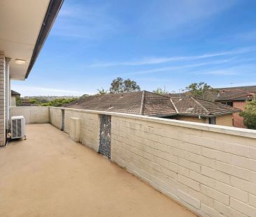 Relaxed Coastal Living in Prime Location - Photo 1