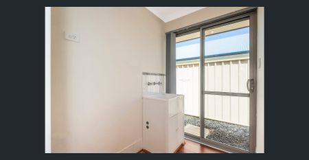 Bright, Modern & Low-Maintenance Living in Prime Location - Photo 2