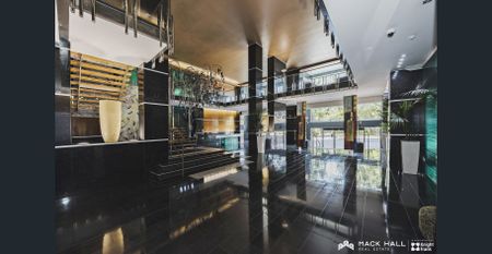 Fully furnished contemporary Living at Condor Towers - Photo 2