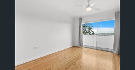 Spacious Modern Living with Beautiful Lake Views - Photo 2