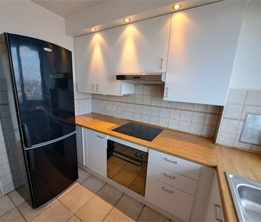 Een gunstig gelegen appartement met lift en met zicht op de skyline... - Photo 2