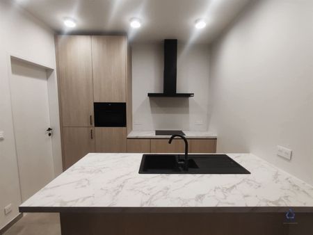 Energiezuinige nieuwbouwappartement met staanplaats en gemeenschappelijk zwembad - Photo 5