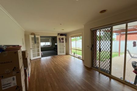 Modern 4-Bedroom Home with Multiple Living Areas - Photo 3