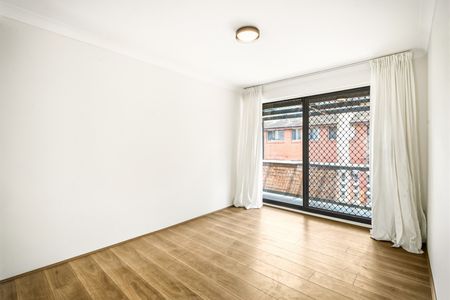 Air-Conditioned Renovated Two-Bedroom Unit with Two Balconies! - Photo 4