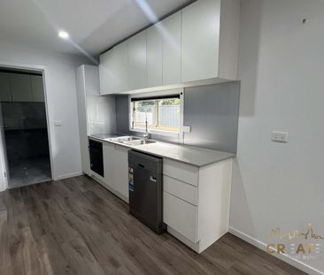 MODERN 2-BEDROOM LIVING IN A HIGHLY CONVENIENT LOCATION - Photo 1