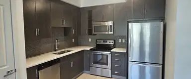 Auburn Bay 2 Bed 2 Bath Condo | 301 - 25 Auburn Meadows Ave SE, Calgary - Photo 1