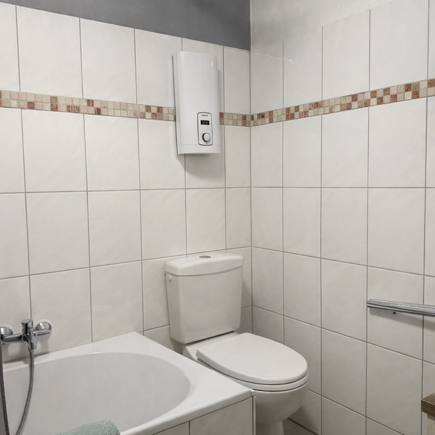 Großzügige 4-Zimmer-Wohnung mit Balkon und Garage in Bergneustadt-Hackenberg - Foto 2