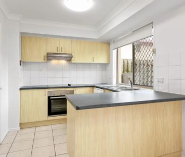 Modern Three-Bedroom Home with Private Courtyard and Entertaining S... - Photo 6