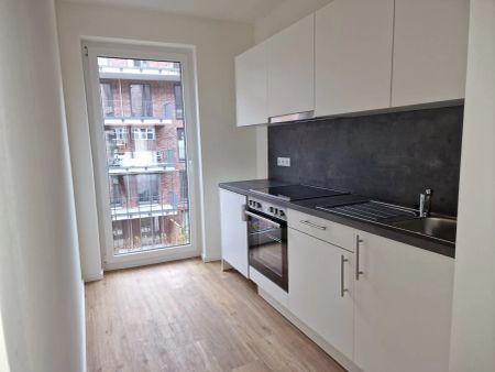 Kieler HÖRN 2-Zimmer Wohnung mit Loggia (Balkon) EBK, Aufzug, 2. OG, Baujahr 2023 - Photo 2