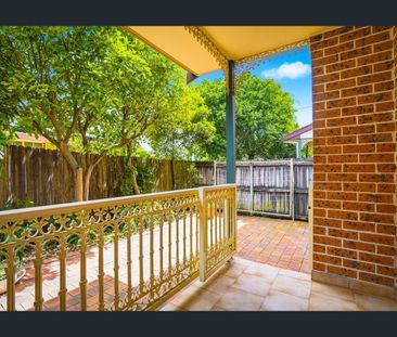 Freshly Updated Three-Bedroom Townhouse with Double Garage - Photo 6