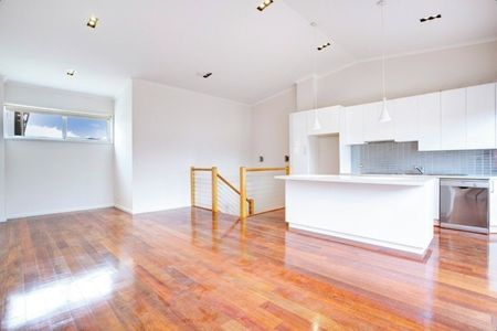 SPLIT LEVEL APARTMENT WITH SECURE PARKING - Photo 3