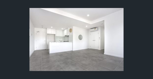 PERFECTLY LOCATED TWO BEDROOM UNIT! - Photo 1