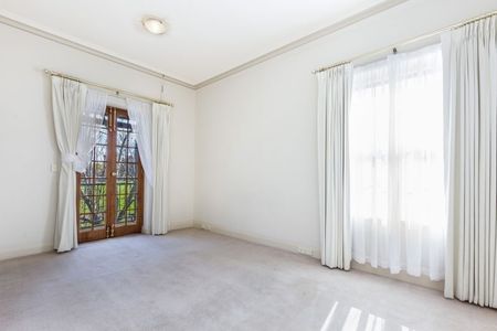 Top-Floor Living with Park Views & Incredible Convenience - Photo 4