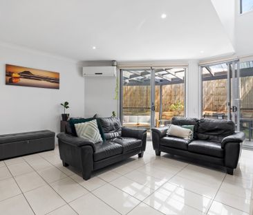 Bright and Airy Two-Bedroom Townhouse in Prime Location - Photo 3
