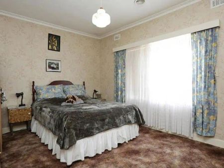 “Quiet & Convenient three Bedroom Home!” - Photo 3