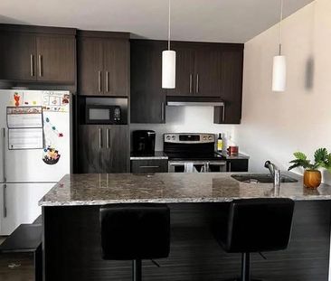 Appartement style condo - Photo 2