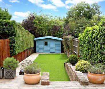 Delightful period cottage with south facing garden in this sought a... - Photo 1