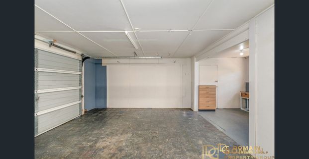 Charming Beachside Family Home in Convenient Location - Photo 1