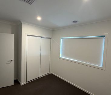 Modern 4 Bedroom Home in Growing Beveridge Community - Photo 3